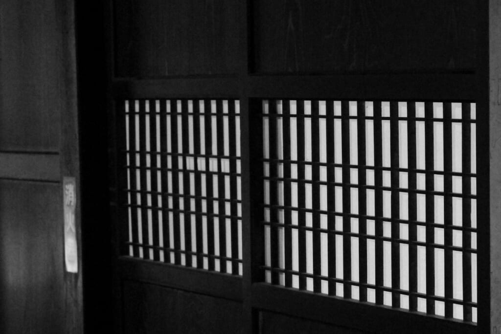Lattice window of an old wooden house